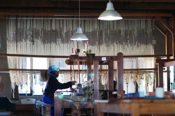 Thabita Mavuso, now retired, weaves on her loom